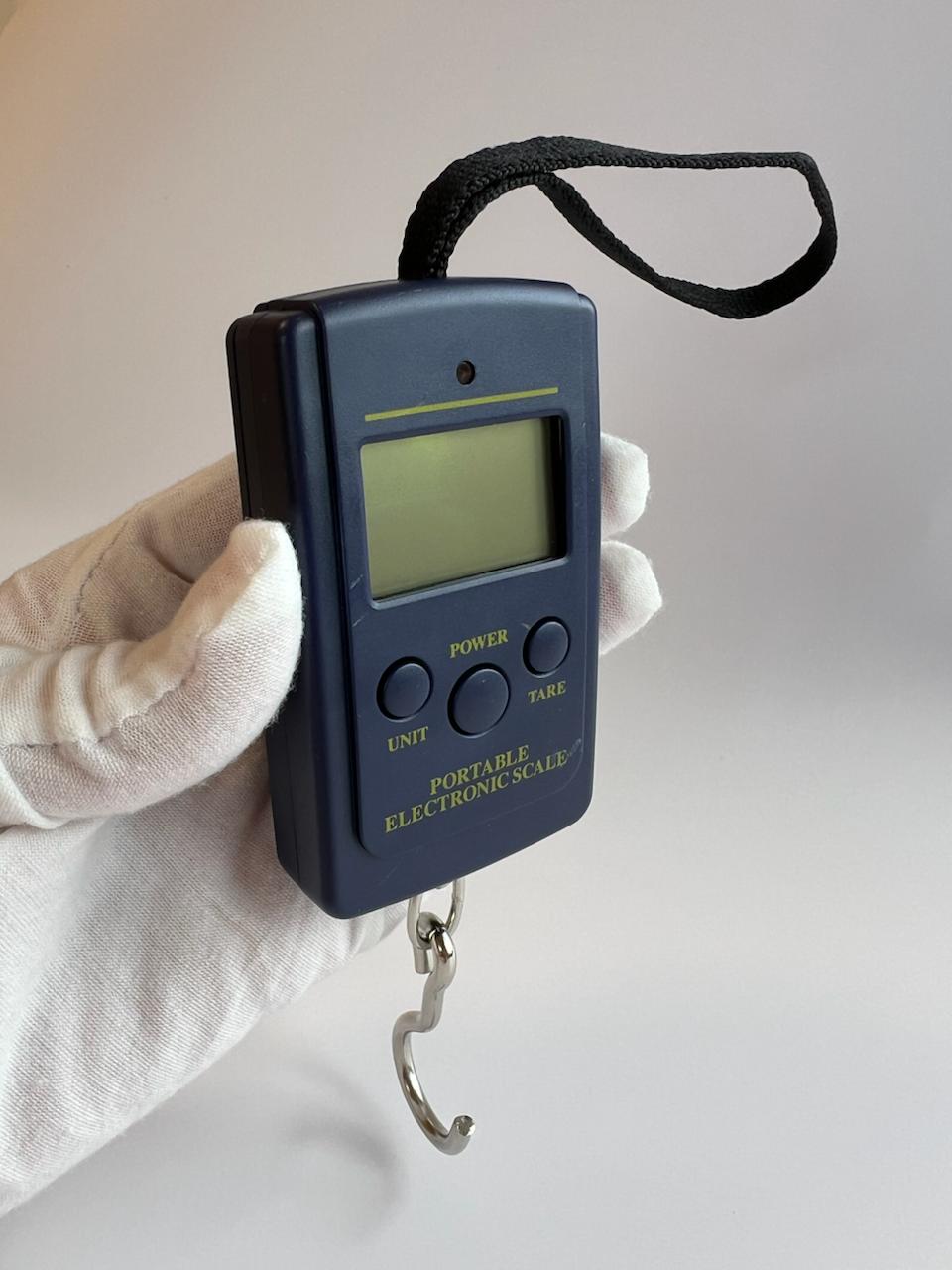 Портативні кишенькові ваги зі сталевим гачком до 40 кг. Портативні кишенькові ваги зі сталевим гачком до 40 кг.