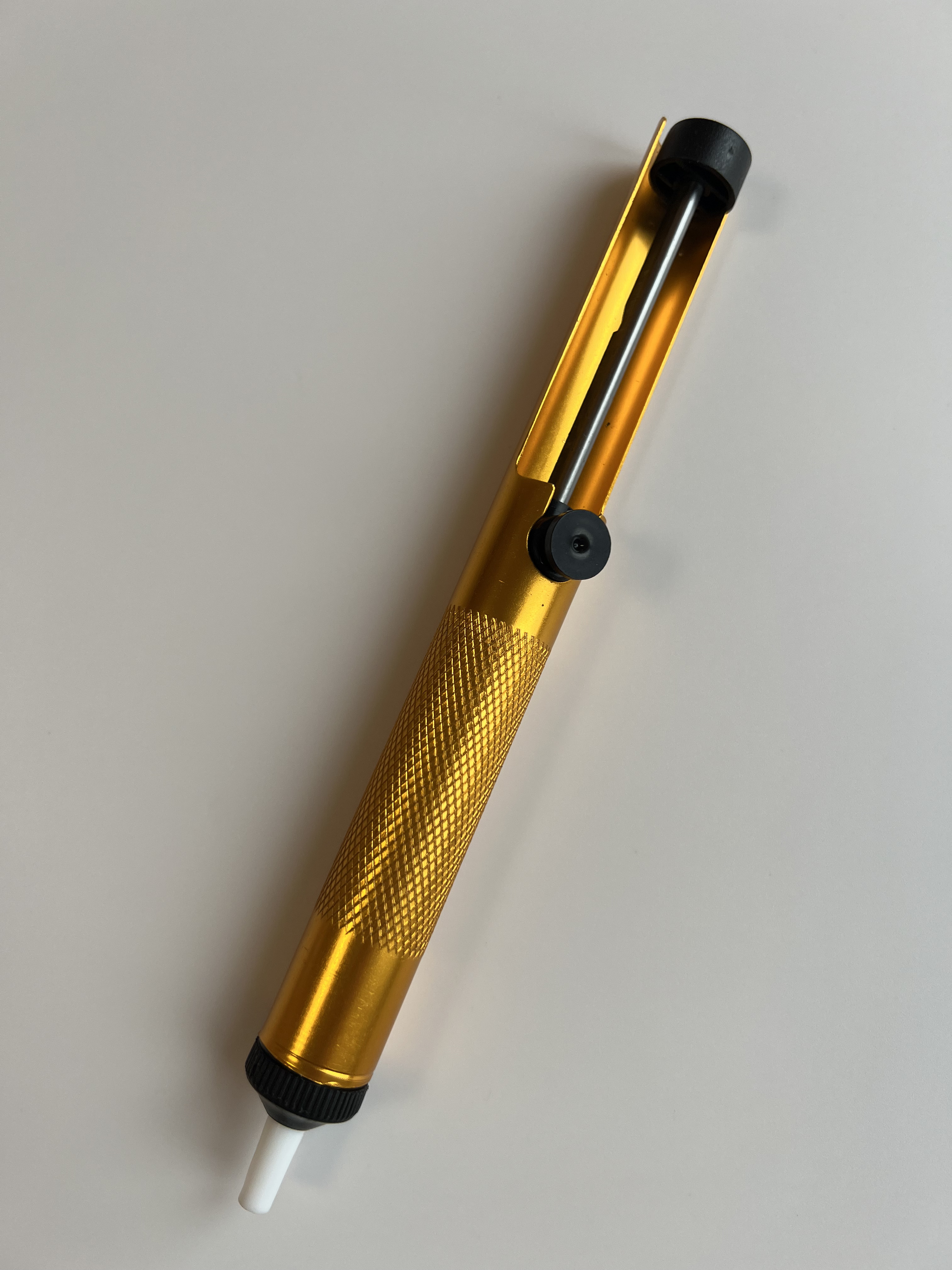 Алюмінієвий олововідсмоктувач у золотому кольорі